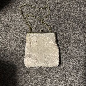 Elegant Cream Woven Clutch with Chain Strap